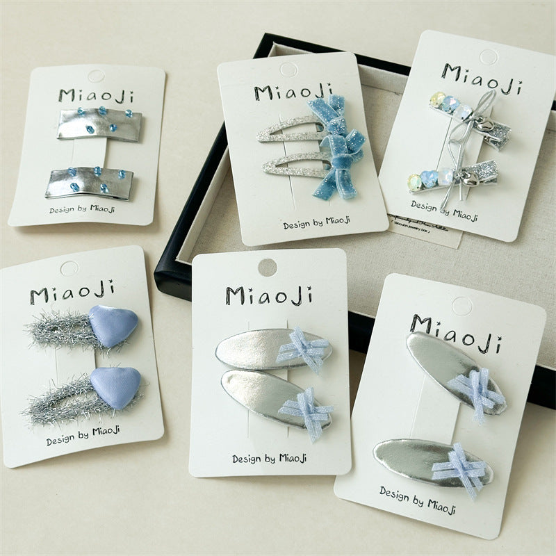 Silver Glitter Bow Clips