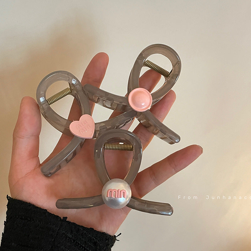Twisted Cute Charm Claw Clip